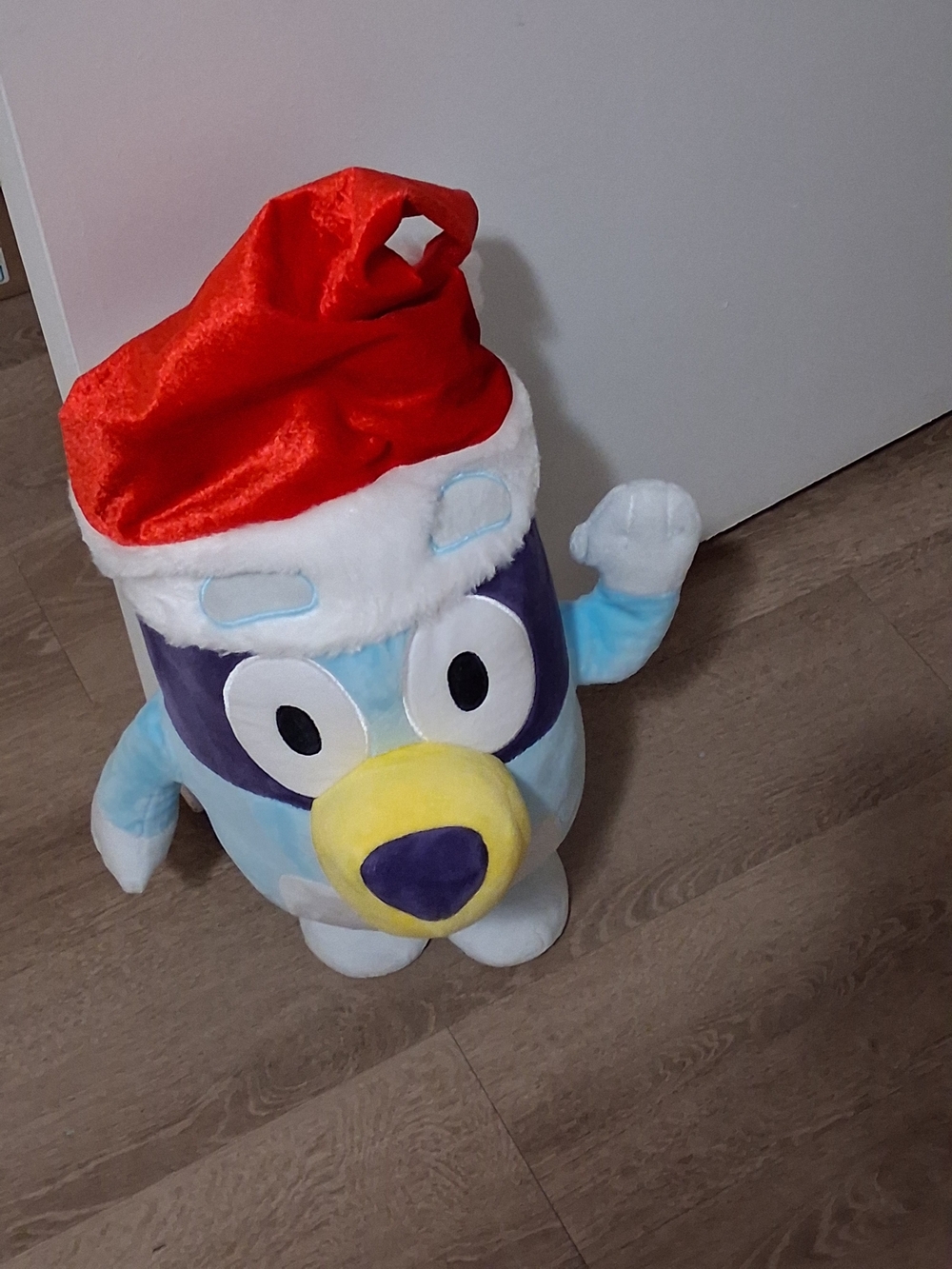 Blue Plush Holiday Character Toy with Red Santa Hat